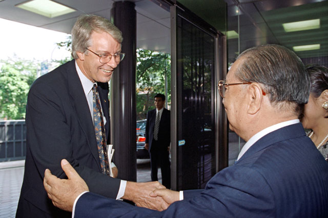 Dr. Clements being greeted by Mr. Ikeda (Tokyo, July 1996)